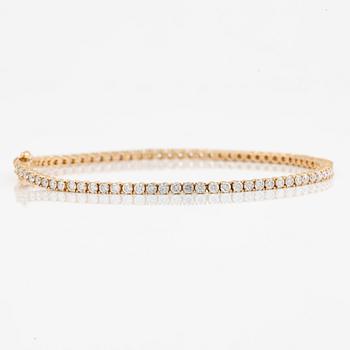 Tennisarmband 18K guld med briljantslipade diamanter.