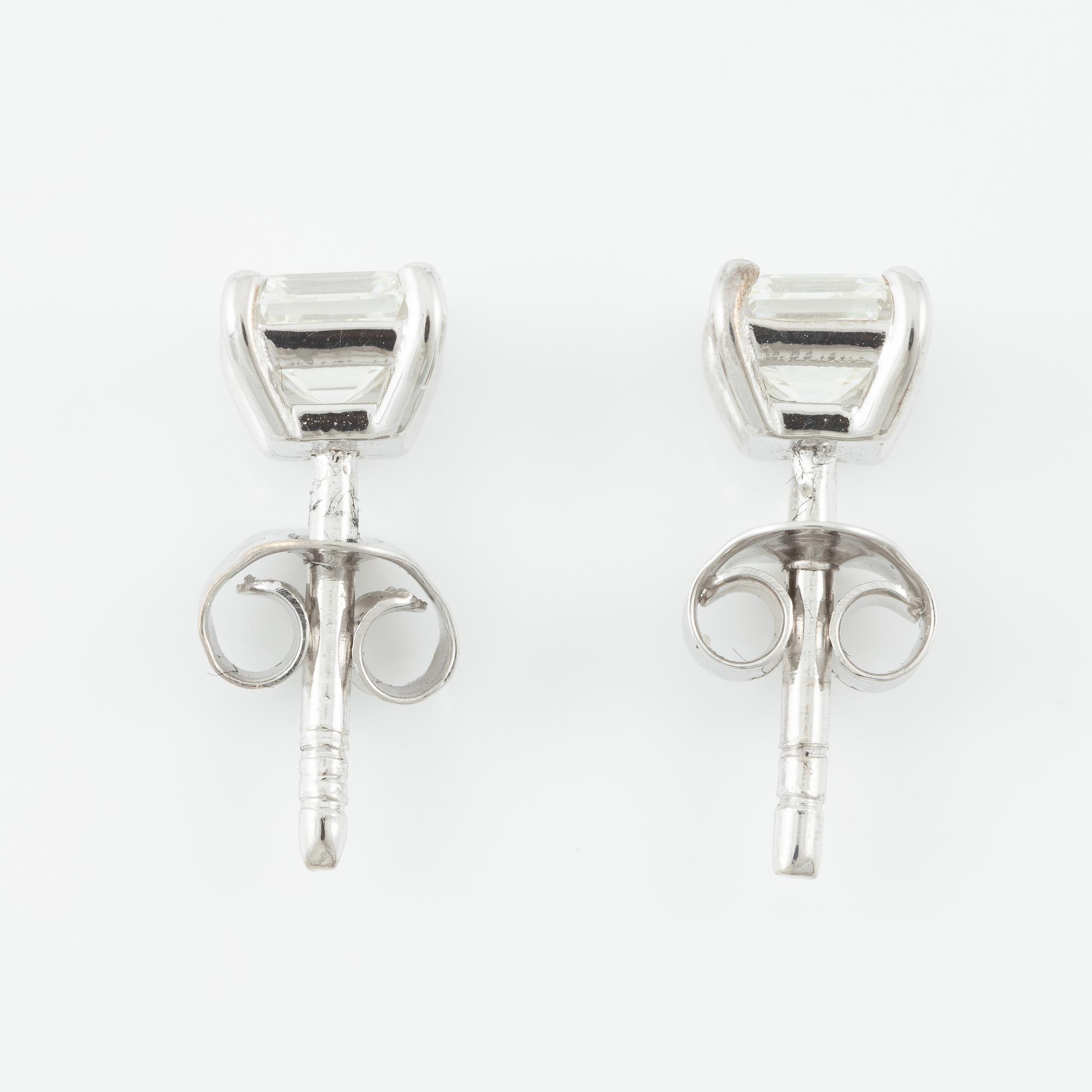 Earrings, a pair, 18K white gold with emerald-cut diamonds, accompanying GIA dossier.