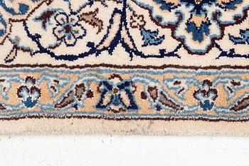 An oriental carpet, c. 310 x 200 cm.