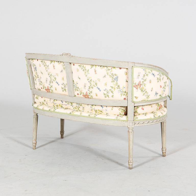 A Louis XVI early 1800s sofa.