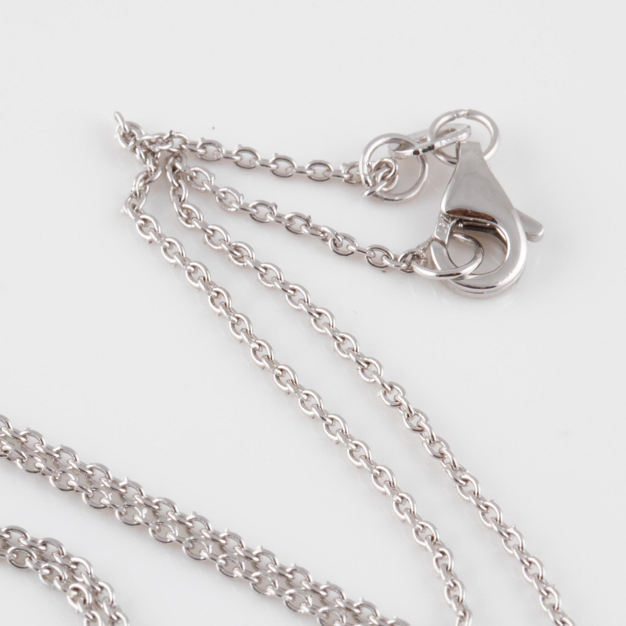 COLLIER, 18K vitguld med dropp- och briljantslipade diamanter ca 0.40 ct. Vikt 3,1 gram.