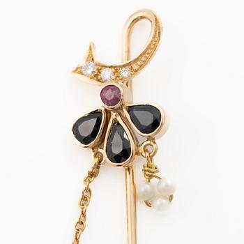 Lapel pin, 18K gold with brilliant-cut diamonds, sapphires, a ruby and pearls.
