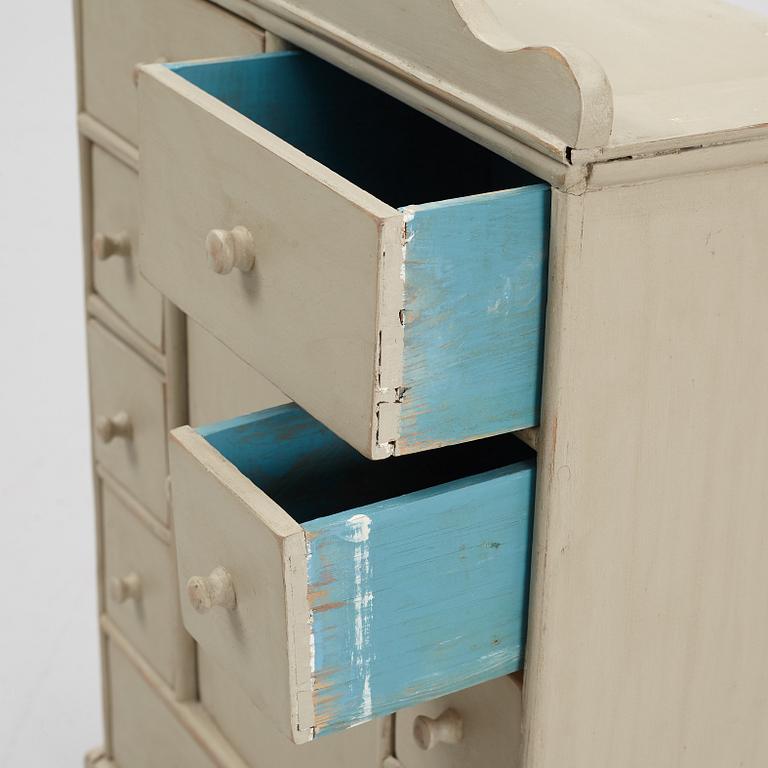 A spice cabinet, late 19th century.