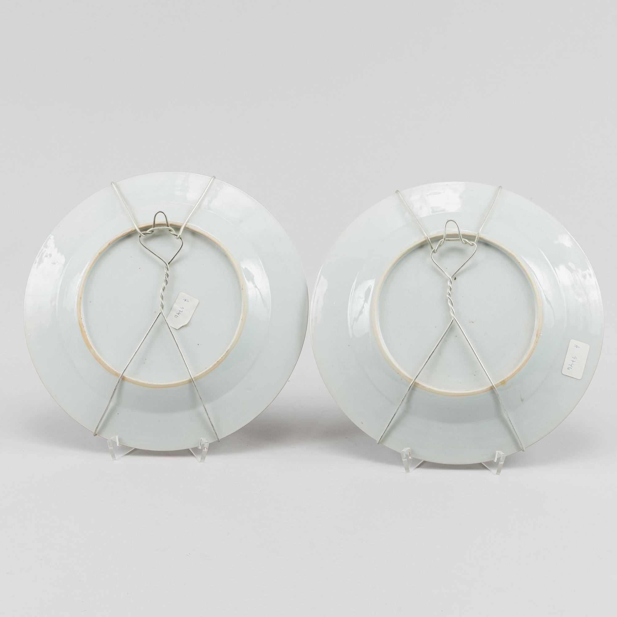 A famille rose dish and two dinner plates, Qing dynasty, Qianlong (1736-95).