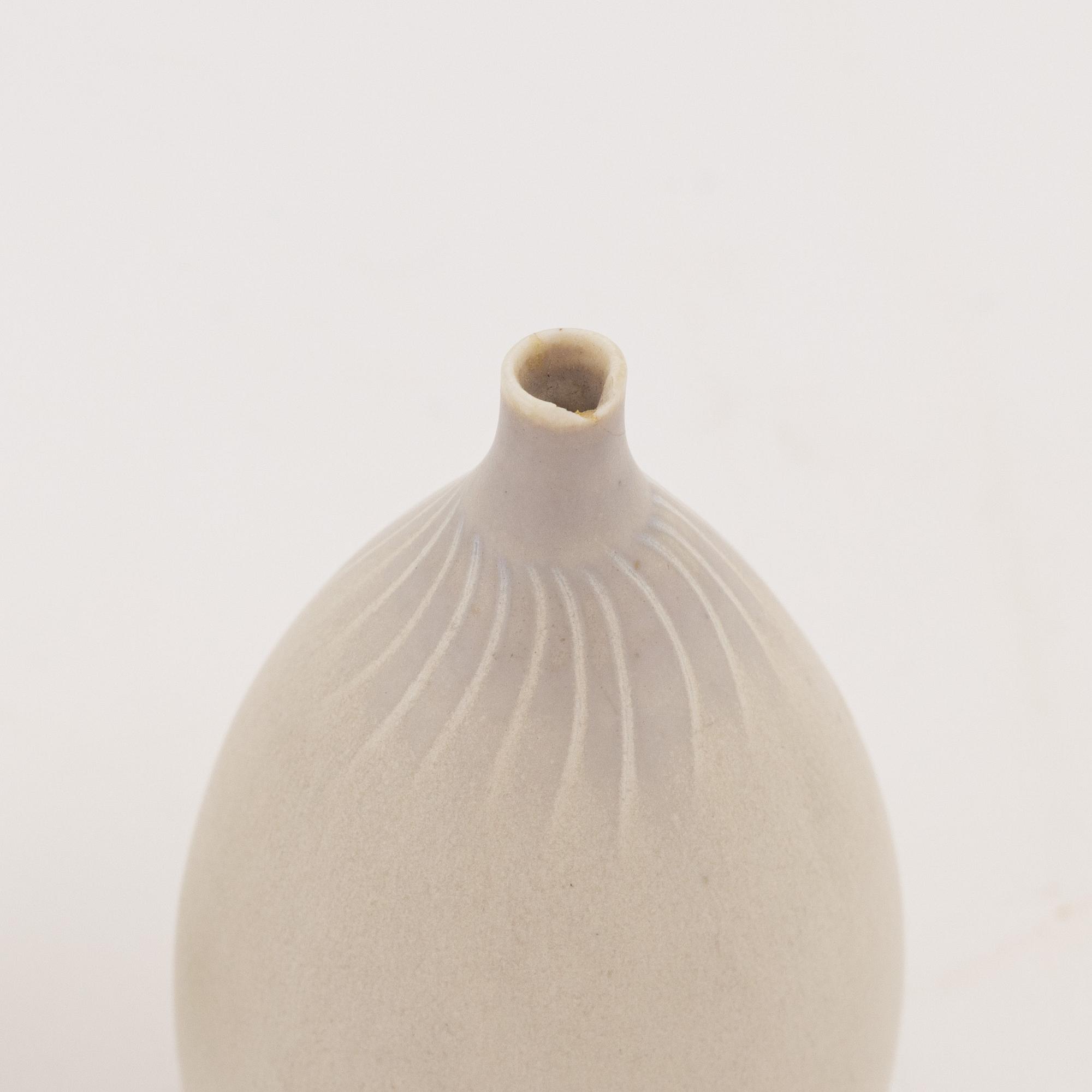 Stig Lindberg, a set of four stoneware miniatures, Gustavsbergs studio.