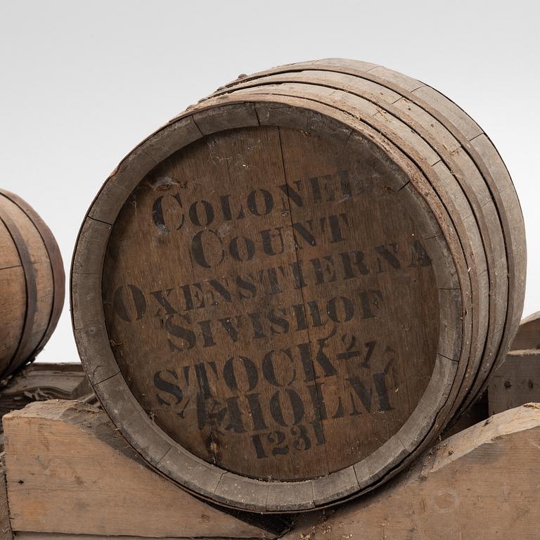 A pair of oak wine casks on stands, early 20th century.