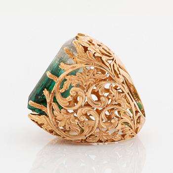 A Tina Karlsson ring in 18K gold set with a large step-cut tourmaline.