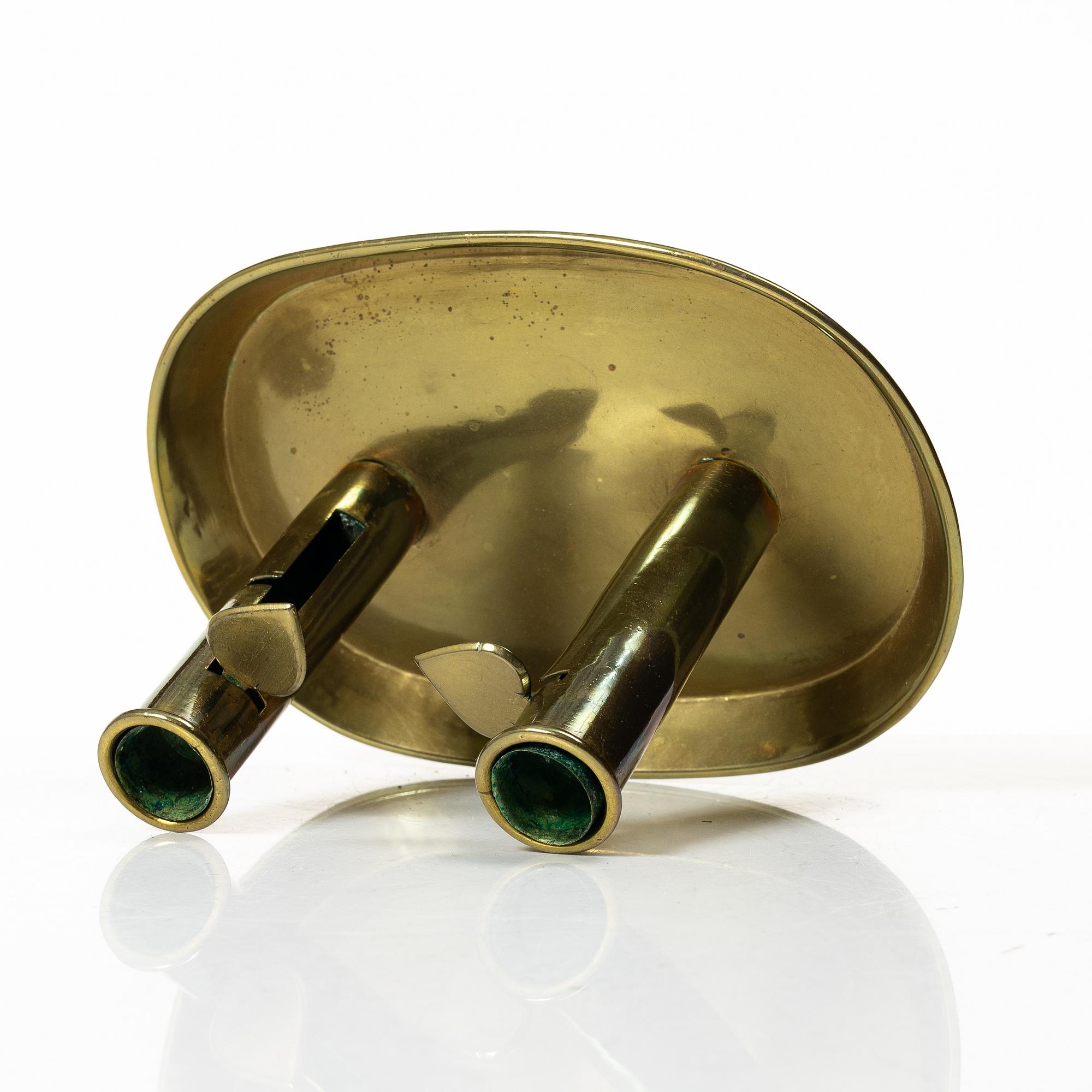 Candelabra, 4 pcs, and a chamberstick for two candles, brass, 19th century.