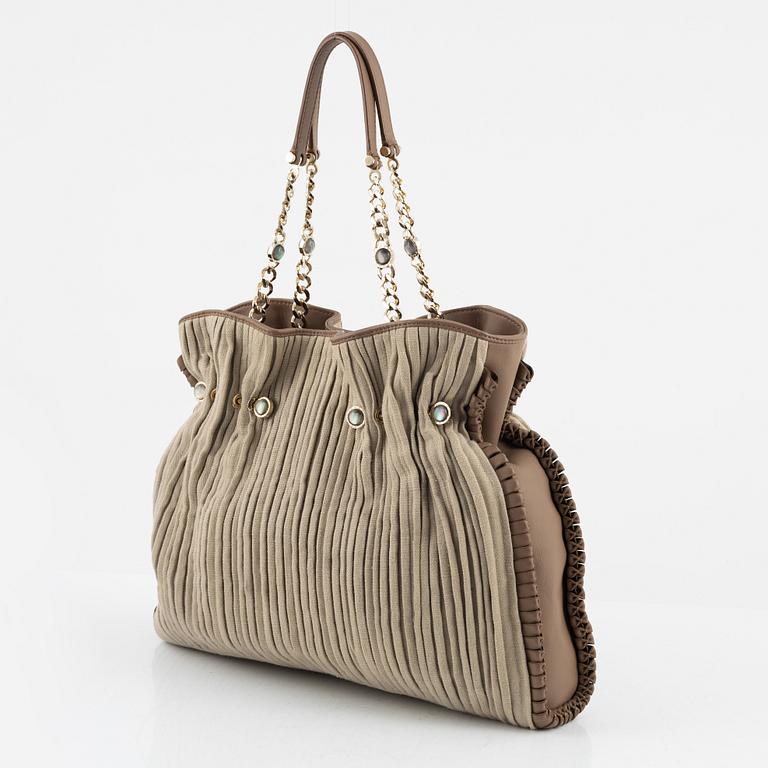 Bulgari, a leather and canvas bag.
