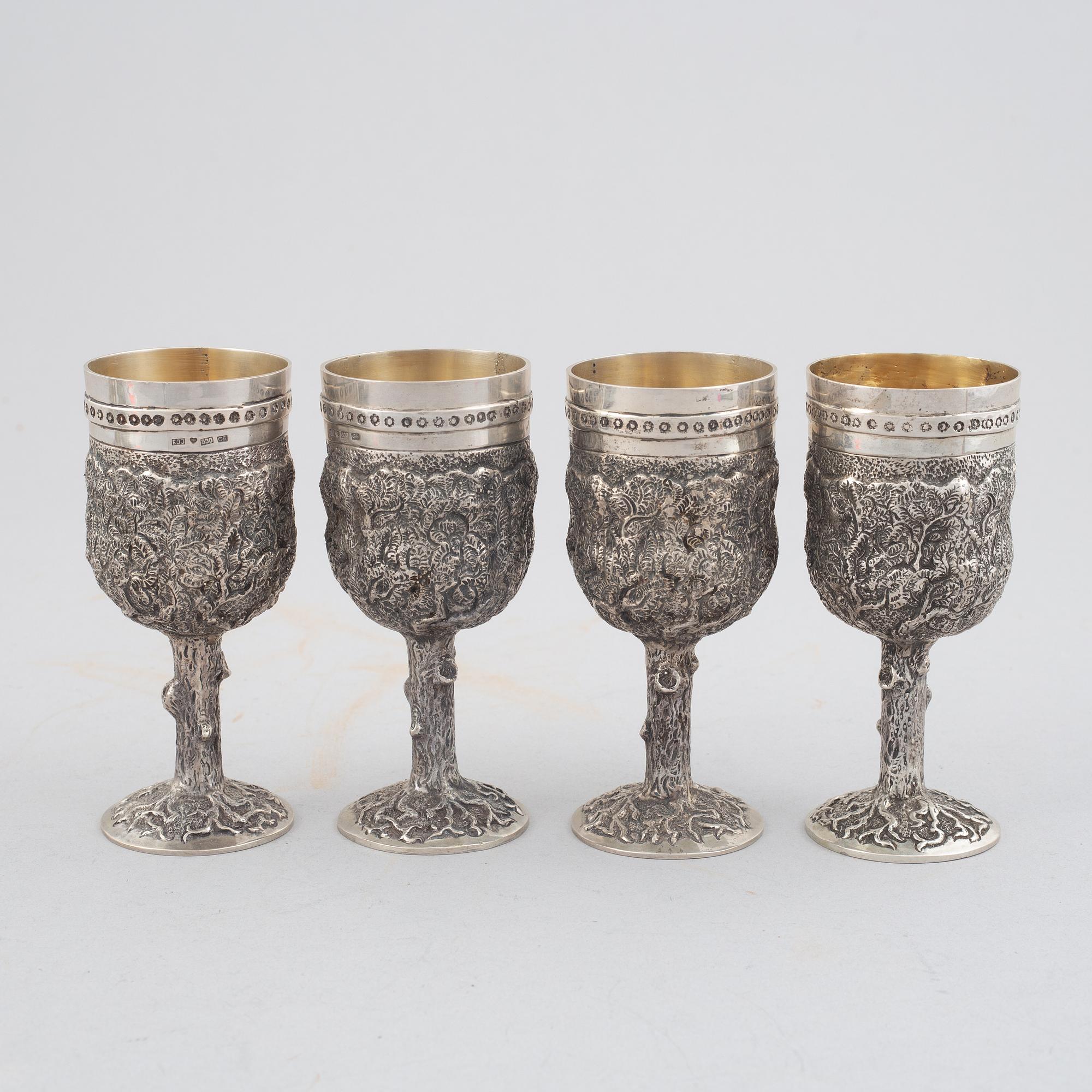 E.Jäntti, four silver cups, a three-piece silver coffee service and a silver tray, Helsinki, Finland,1979-81.