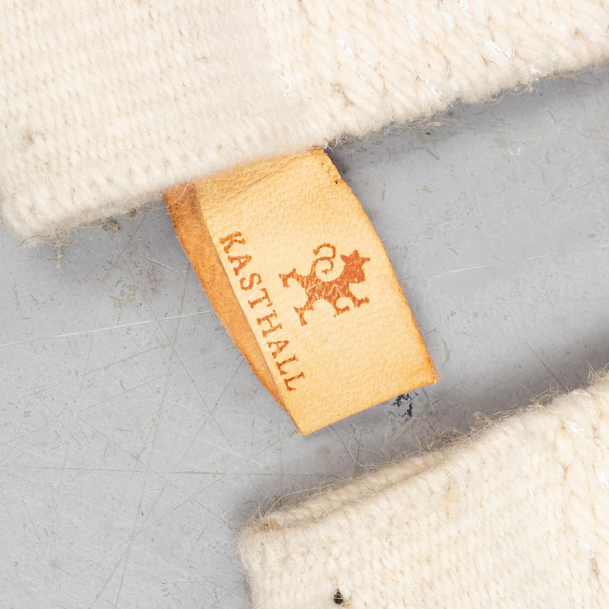 A carpet/textile, "Häggå 981", machin woven, Gunilla Lagerhem, Ullberg Kasthall, ca 290 x 30 and 70 cm.