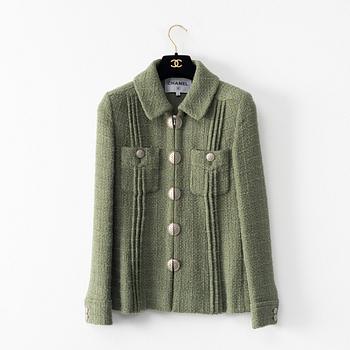 Chanel, A green bouclé jacket, french size 34.