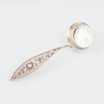 Gustaf Folcker, a silver sugar spoon with filigree, Stockholm 1814.