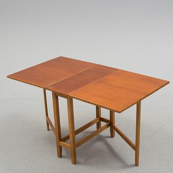 A mid 20th century flap table.