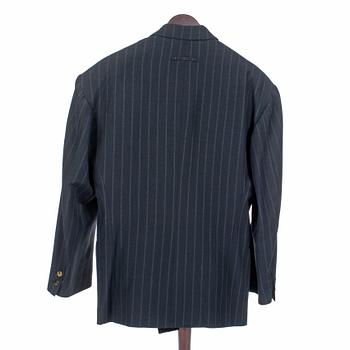 JEAN-PAUL GAULTIER, a black woolblend pinstriped men's jacket and pants. Size 50.