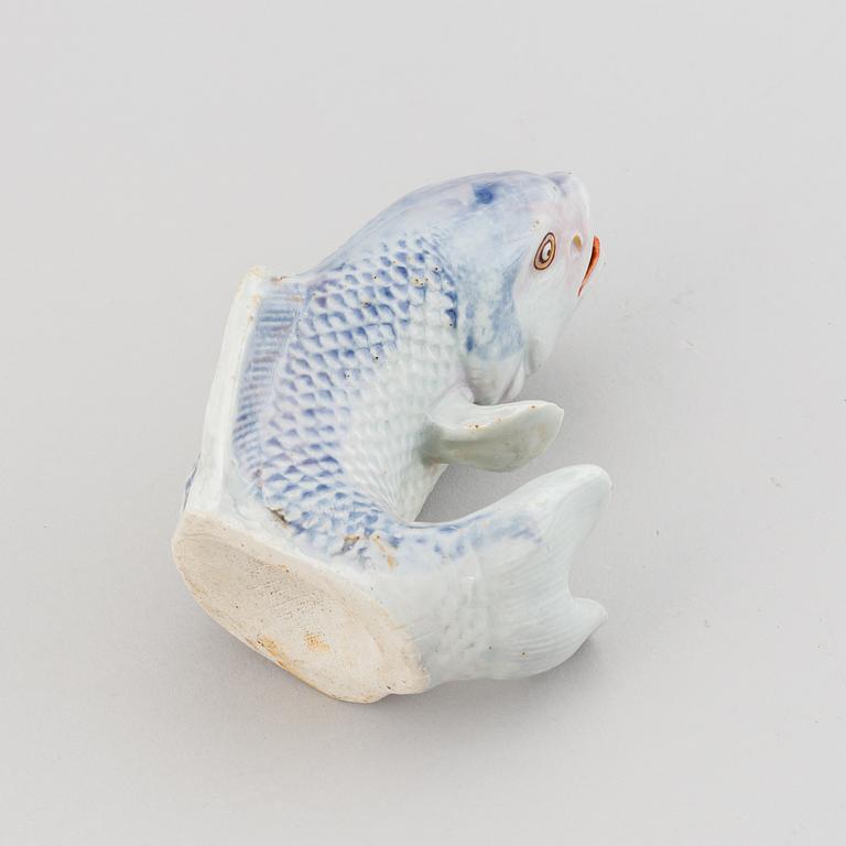 A Japanese porcelain model of a leaping fish, Meiji period (1868-1912).