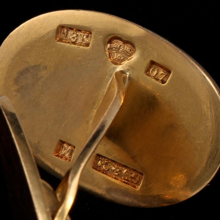 MANSCHETTKNAPPAR samt KRAGKNAPPAR, 18k guld, Gustav Dahlgren & Co, Malmö, 1900-talets första hälft. Total vikt 12 g.