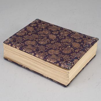 Two signed photographs of the Japanese crown prince and his wife and a photo album.