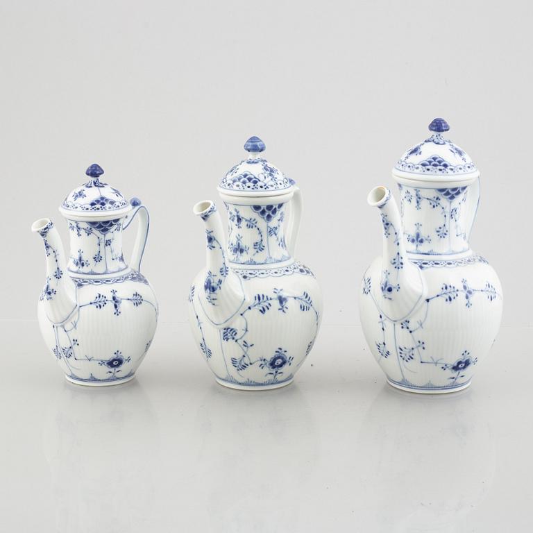 A set of three Royal Copenhagen Musselmalet half lace coffee pots with covers, Denmark, 20th century.