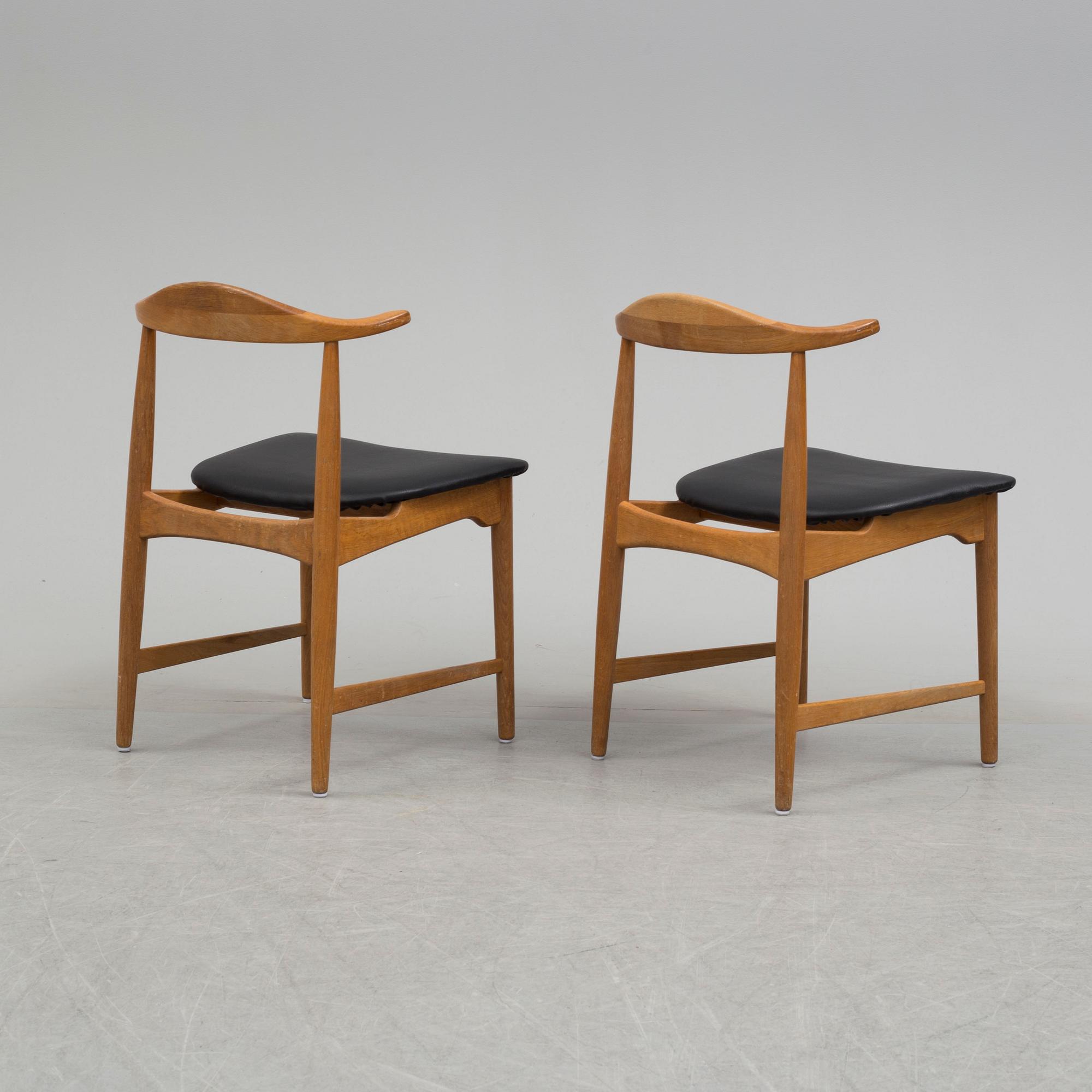 A pair of 1960's 'Danske' oak armchairs by Erik Wörtz IKEA.