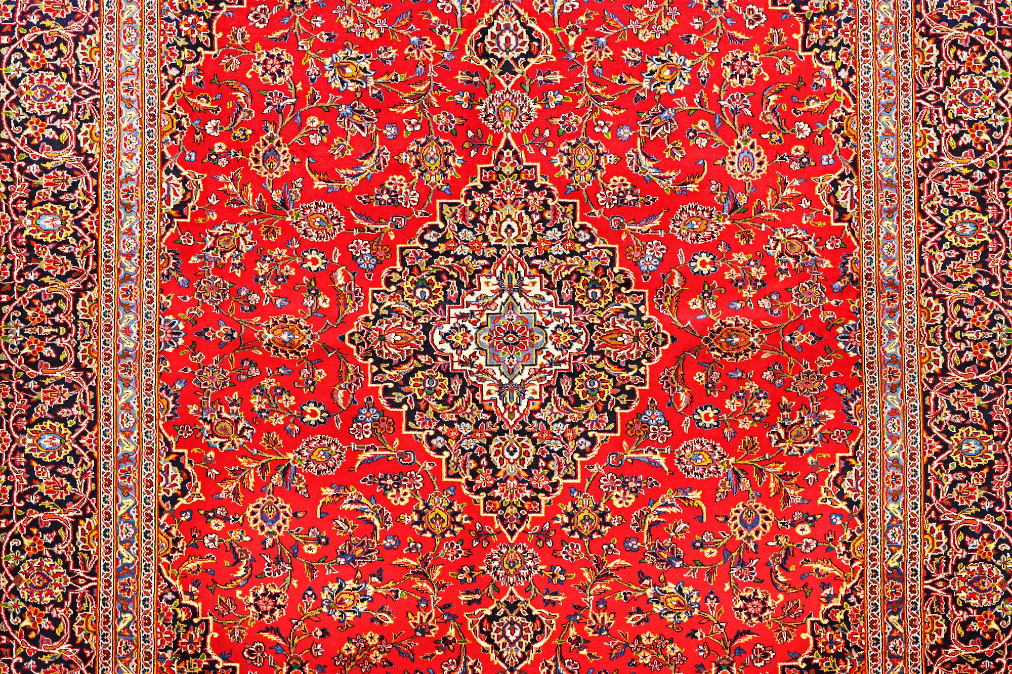A Kashan carpet, c. 388 x 295 cm.