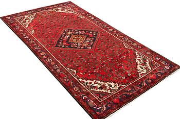 A Hamadan carpet, c. 299 x 159 cm.