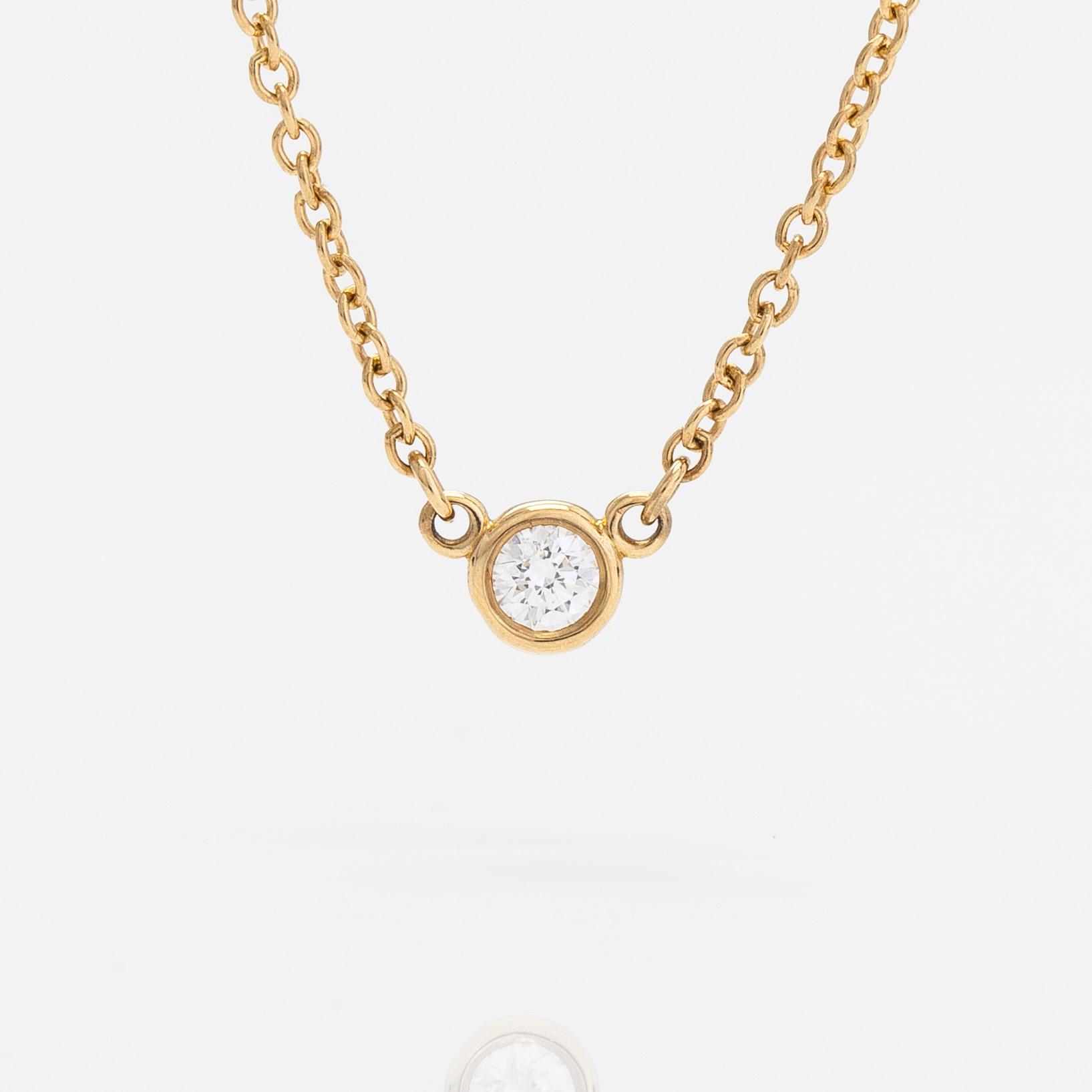 Tiffany & Co, Elsa Peretti, halsband, "Diamonds by the Yard", 18K guld med en diamant ca 0.05 ct.