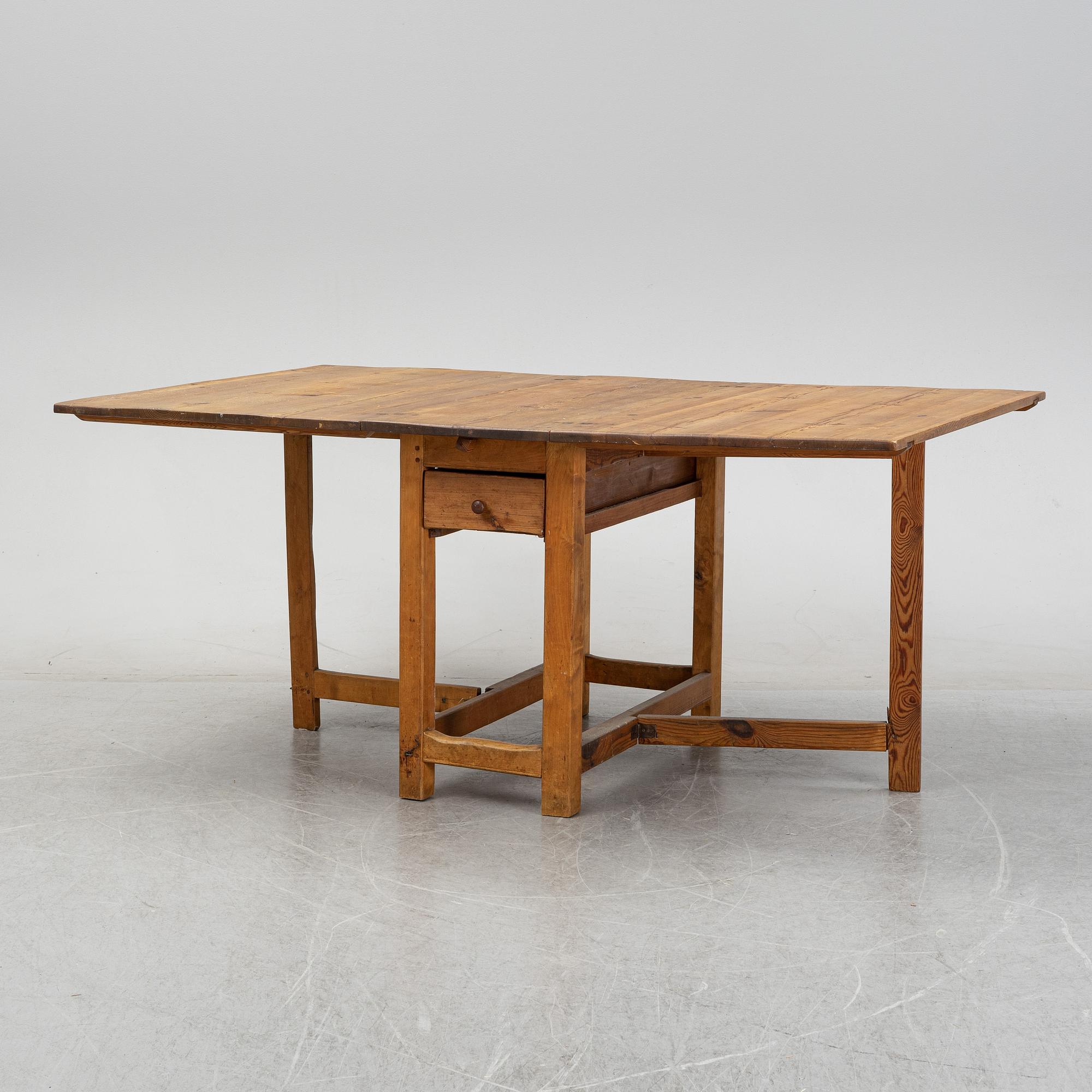 A 19th century gate-leg table.
