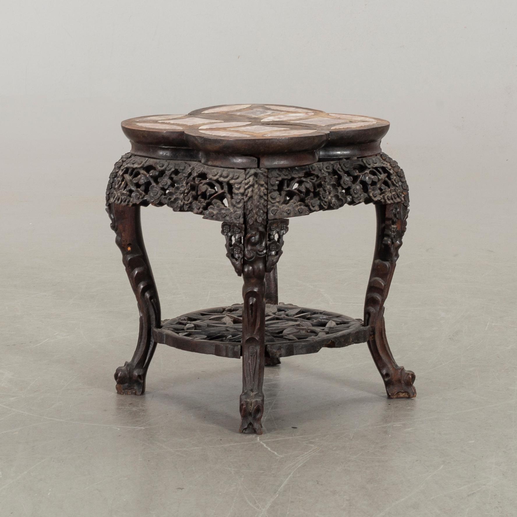 A SMALL CHINESE TABLE/STOOL, around the year 1900.