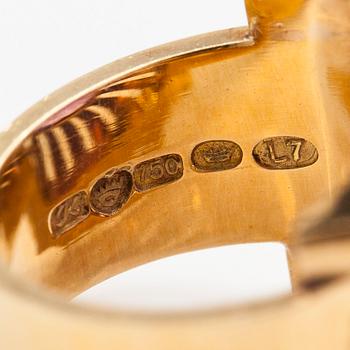 Ring, cocktailring, 18K guld med en ametist. Kultaseppäkoulu, Helsingfors 1964.