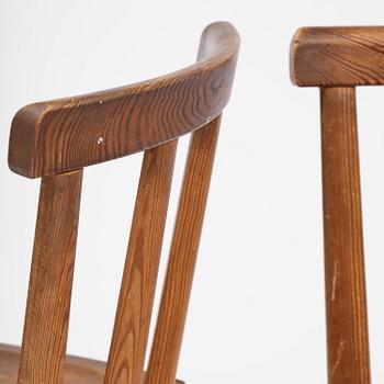 Axel Einar Hjorth, a set of six stained pine "Utö" chairs, Nordiska Kompaniet, Sweden, 1930s.