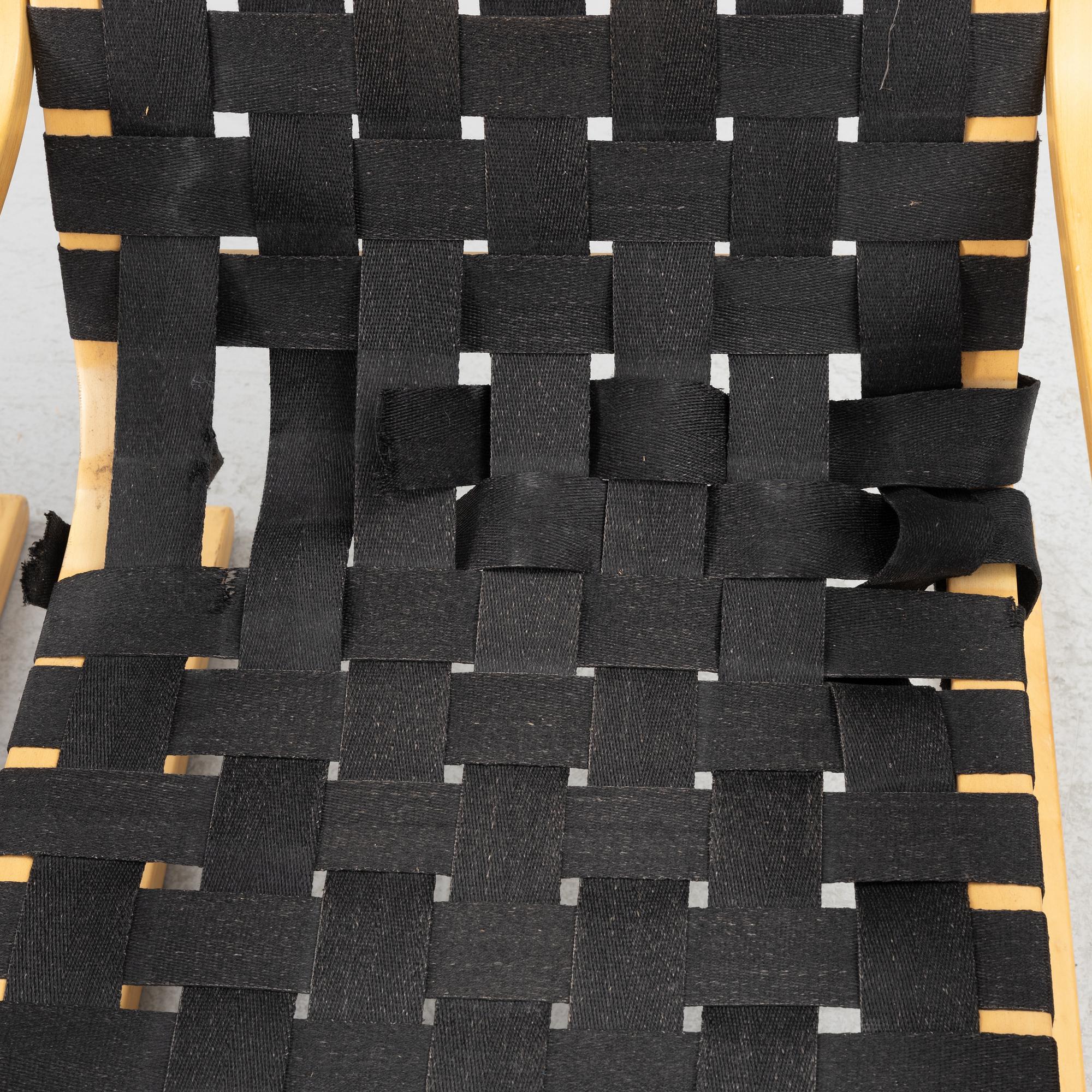 Alvar Aalto, a pair of model 406 armchairs, Artek, end of the 20th century.