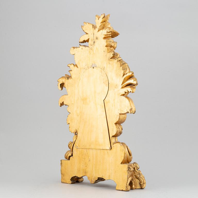 A rococo style table clock, 19th Century.