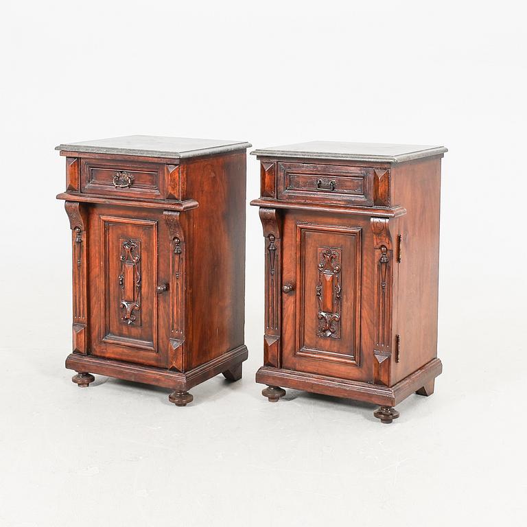 A pair of walnut bedside tables first half of the 20th century.