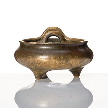 A tripod bronze censer, 17/18th Century with Xuande mark.