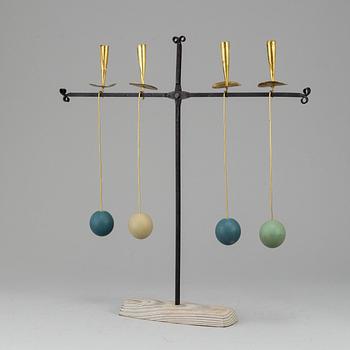THOMAS HELLSTRÖM, a wrought iron and brass candelabrum from THO Hantverk Rättvik, Bleckogården, 1950's.