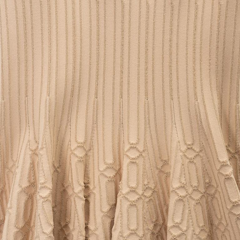 Alaïa, a beige patterned dress, size 36.