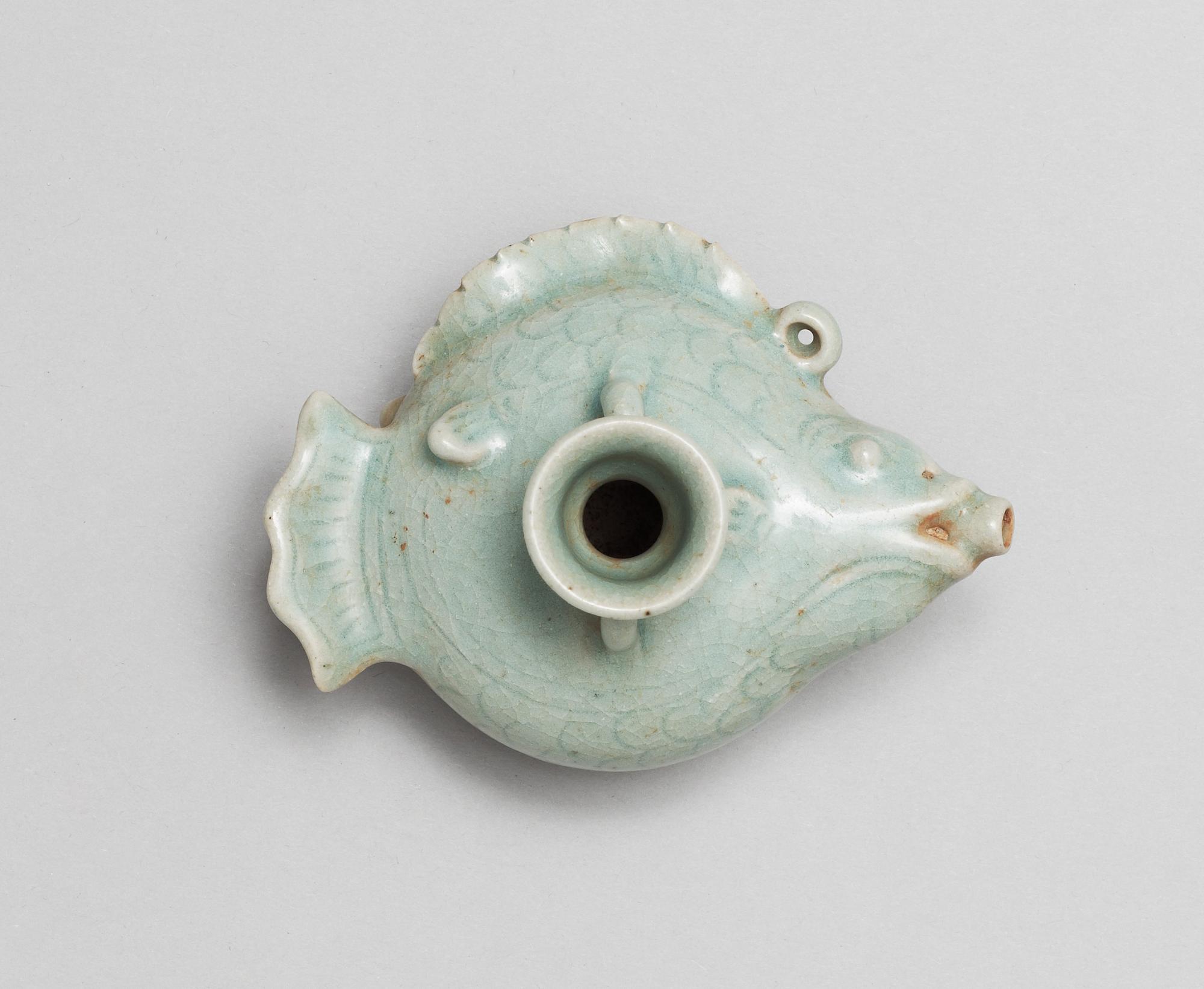 A celadon glazed water-dropper/water pot, Yuan dynasty (1271-1368).