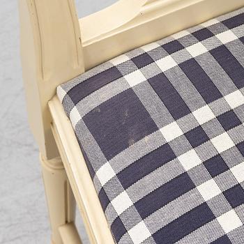 Dining table with 10 chairs, Gustavian style, second half of the 20th century.