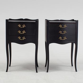 a pair of rococo-style bedside tables.