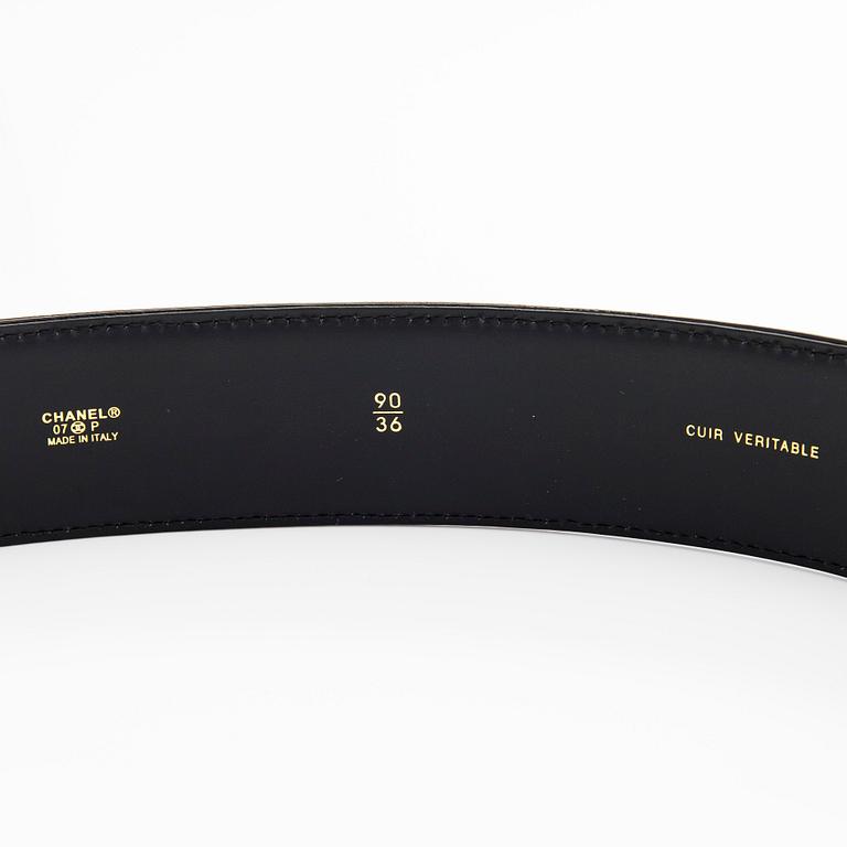 Chanel, a patent leather belt.
