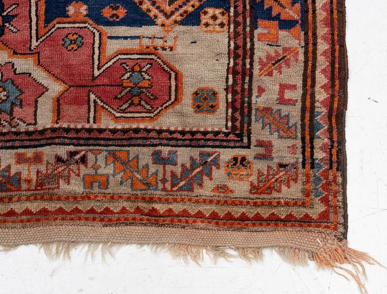 A semi-antique Anatolian rug, c. 335 x 140 cm.