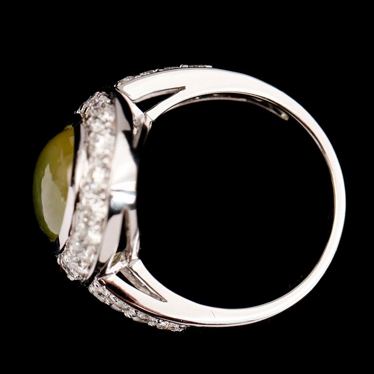 RING, 18 k vitguld, med safir 5.92 ct och briljanter tot 1.04 ct TW.