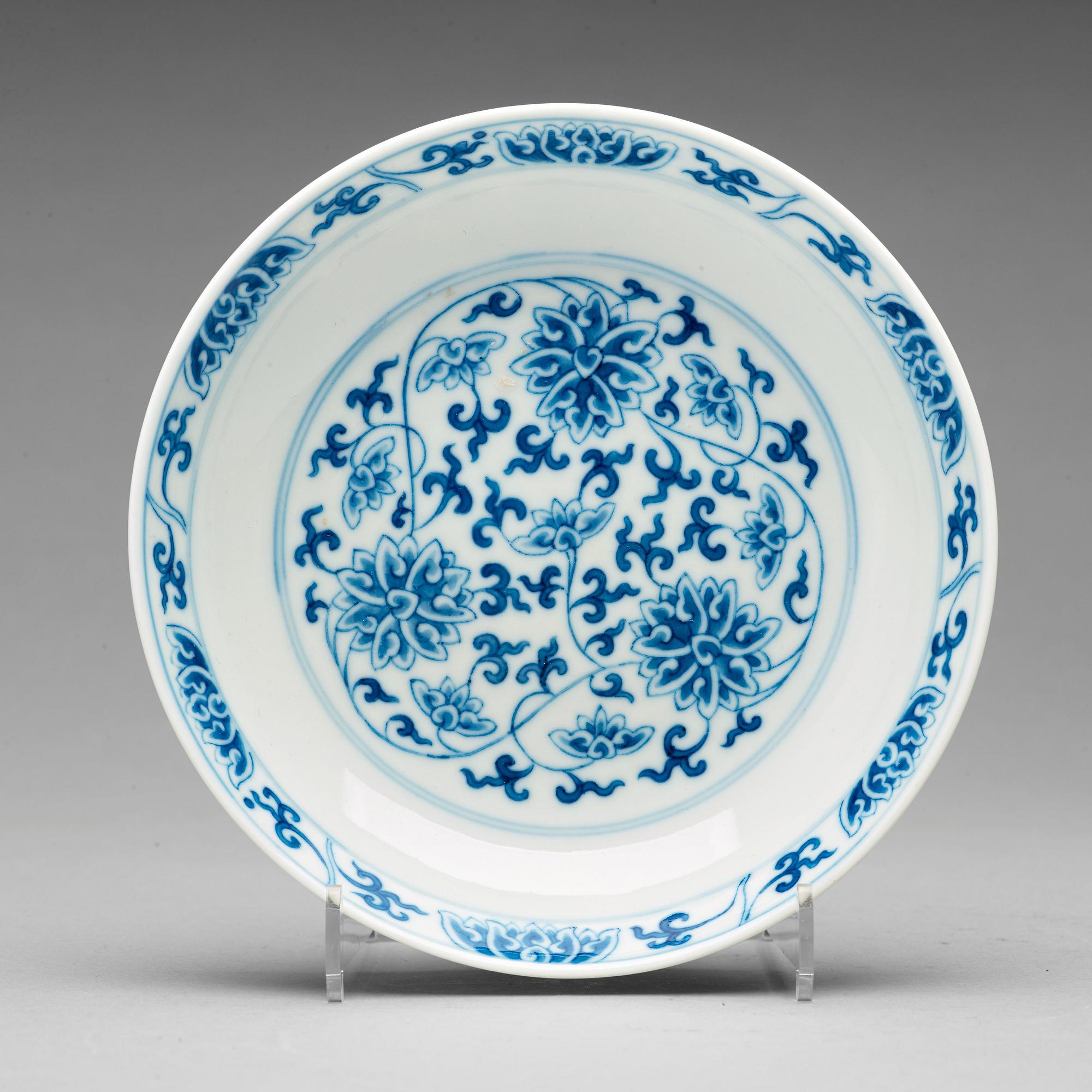A blue and white lotus dish, Qing dynasty with Tongzhis mark to the base.