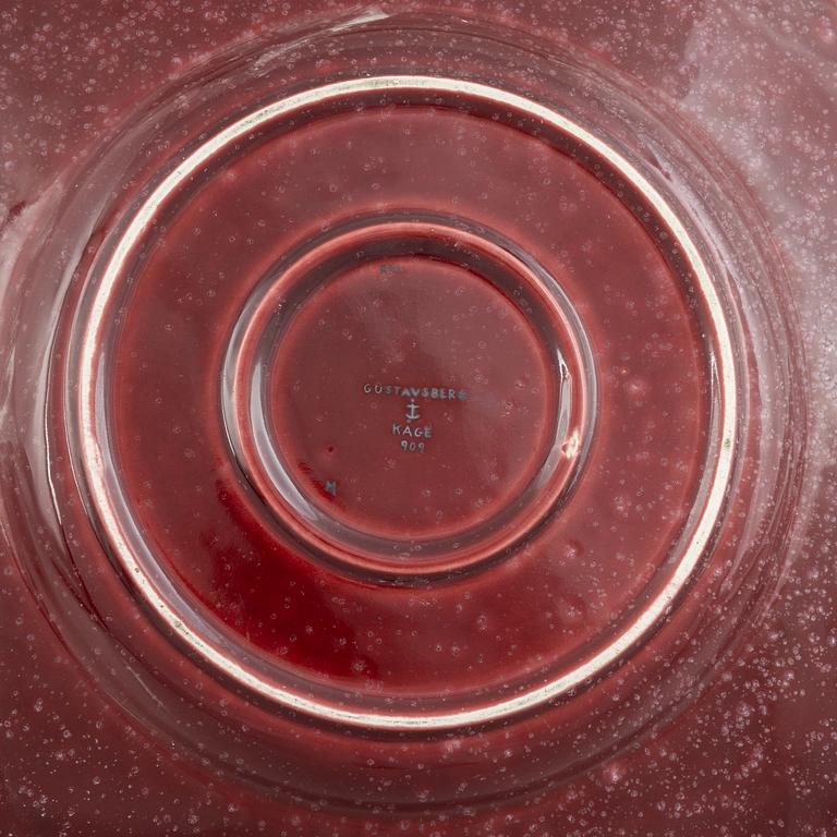 Wilhelm Kåge, a model 909 red "Argenta" dish, Gustavsberg, Sweden, 1943.