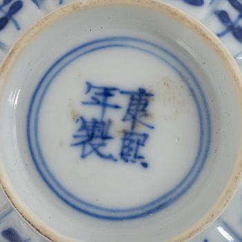 A group of two Chinese blue and white bowls and a cup, part 17th and 18th century.