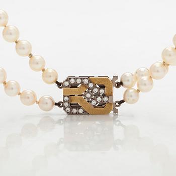 Pärlcollier, lås 18K guld med diamanter. St Eriks Silversmedja, Stockholm, 1987.