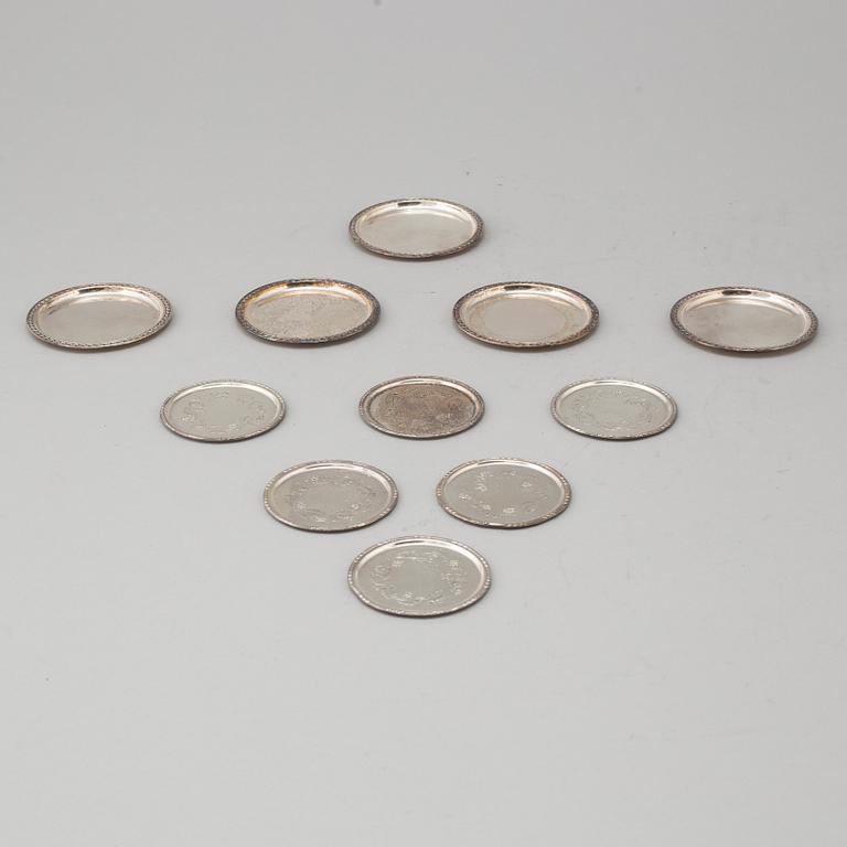 GLASUNDERLÄGG/COASTERS, 11 st, silver. Georg Jensen, sterling, Danmark respektive GAB, Stockholm, 1963-5.