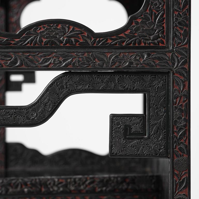 A lacquer display cabinet, late 19th century.