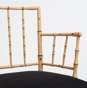 A pair of late Gustavian bamboo imitation armchairs by Ephraim Ståhl, master in Stockholm 1794-1820.
